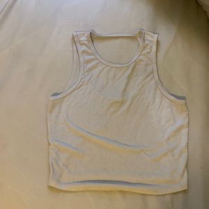 A médium white tank crop top.